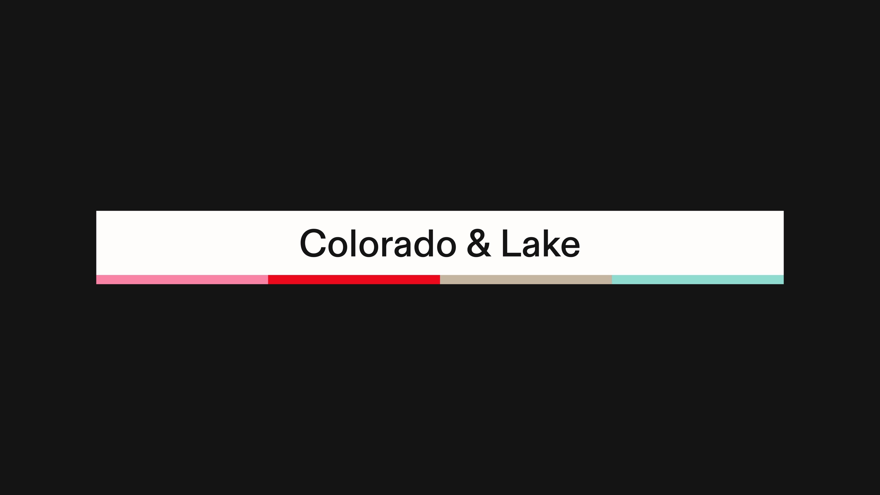 A station name sign with its line colours beneath, 4 of 6.